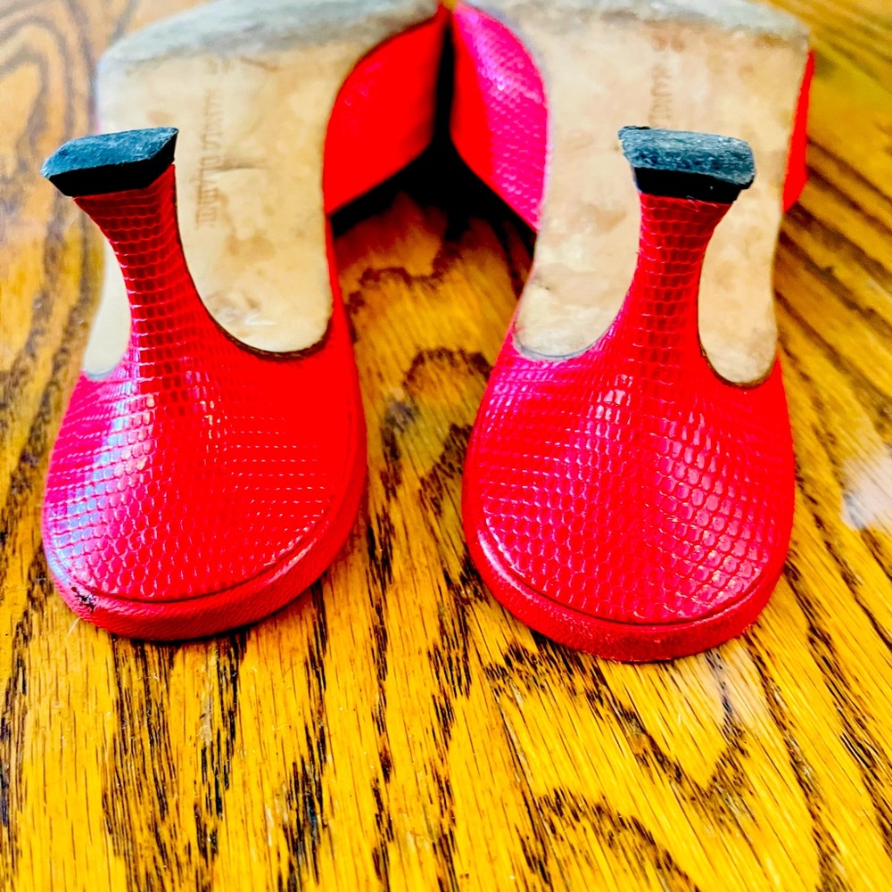 Manolo Blahnik slides.